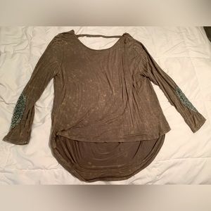 Olive colored backless long sleeve top with knitted patched arm detailed sleeves